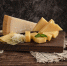 Selective focus shot of a delicious cheese platter on the table with walnuts on it - Газета Восход