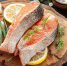 front-view-fresh-fish-slices-with-tomatoes-lemon-slices-dark-raw-color-seafood-dish-photo-meat-food - Газета Восход